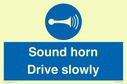 sound-horn-drive-slowly-warehousing-and-delivery-sign~